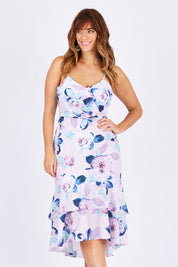 Model Laura wearing size 12 of the Camille Dress in colour BabyPink (Pink), from the front, cropped image