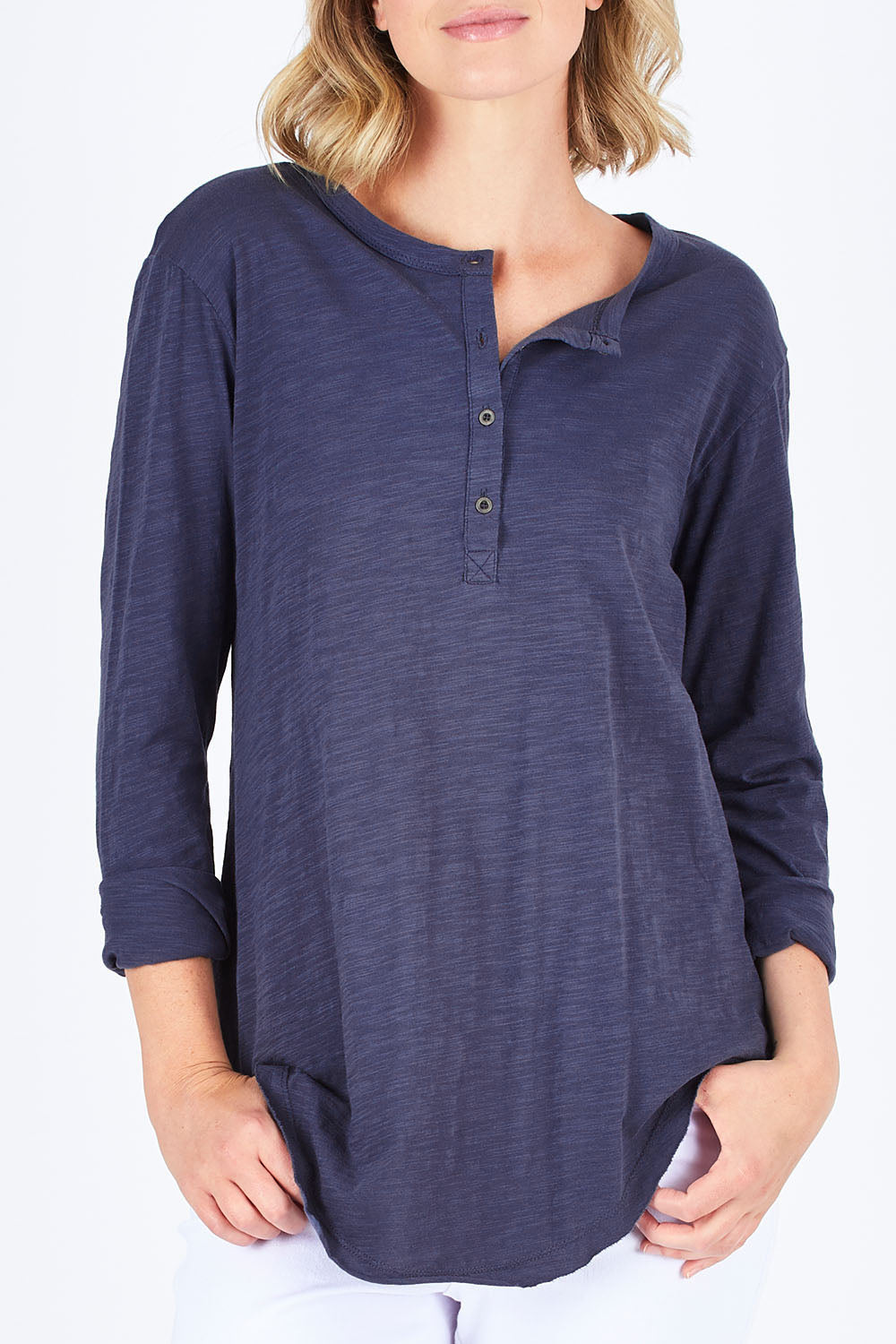 Model Chelsea wearing size S of the Cambridge Henley in colour Indigo (Blue), from the front, cropped image