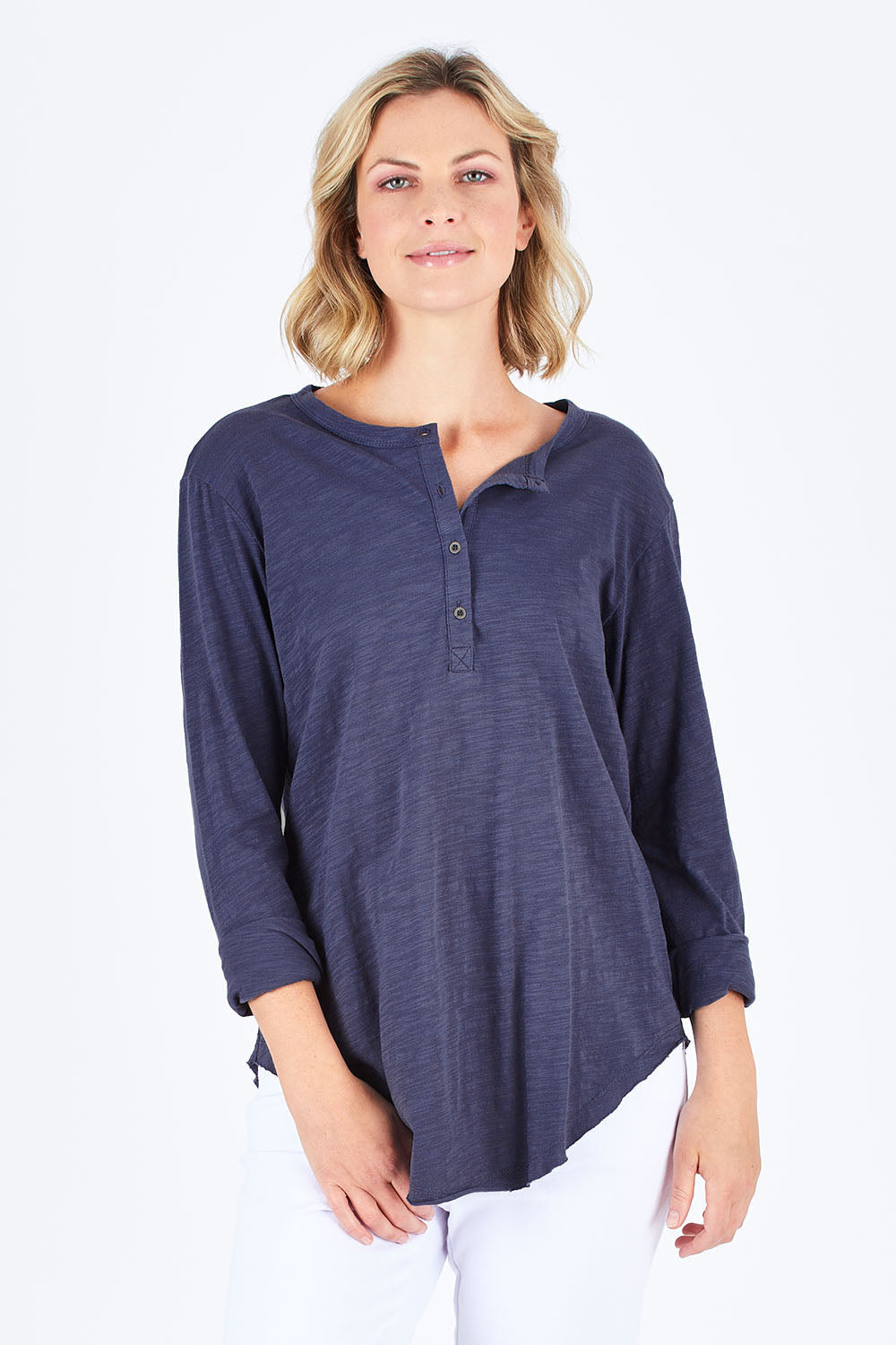 Model Chelsea wearing size S of the Cambridge Henley in colour Indigo (Blue), from the front, cropped image