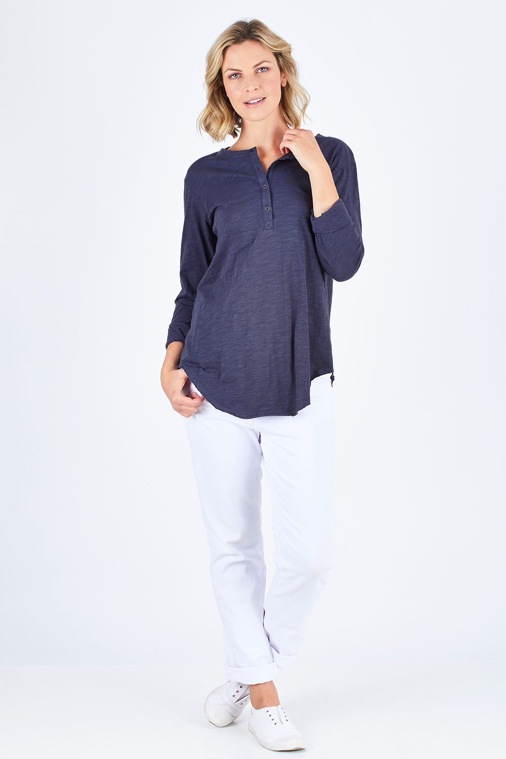 Model Chelsea wearing size S of the Cambridge Henley in colour Indigo (Blue), from the front, showing the whole outfit