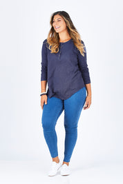 Model Palatina wearing size L of the Cambridge Henley in colour Indigo (Blue), from the front, showing the whole outfit