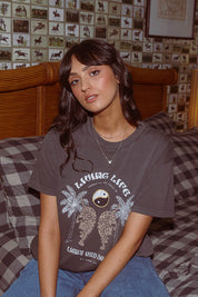 A model wearing the Living Life Standard Tee in colour Charcaol (Grey), from the front, showing the whole outfit