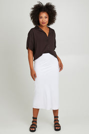 Model Olivia wearing size 10 of the Gracie Shirt in colour Back (Black), from the front, showing the whole outfit