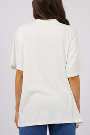 A model wearing the Solar Oversized Tee in colour Vivwhite (White), from the back