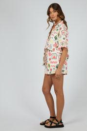 A model wearing the Valencia Cotton Linen Short in colour Print (White), from the front, showing the whole outfit