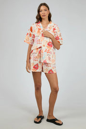 A model wearing the Tyra Cotton Linen Shirt in colour Vwhite (White), from the front, showing the whole outfit
