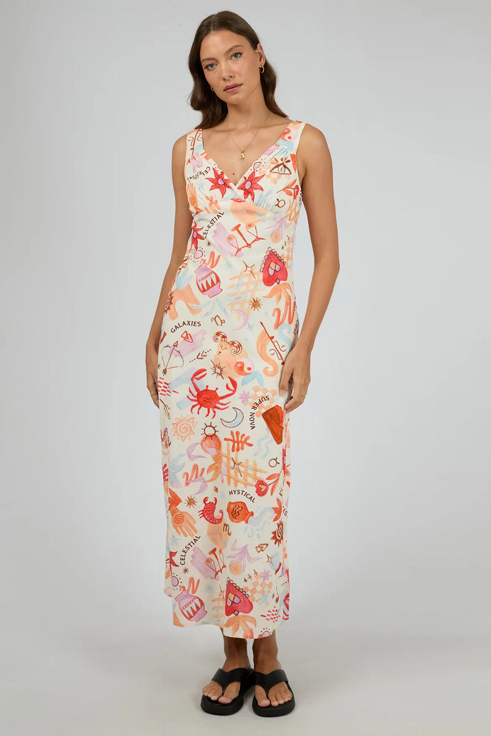 A model wearing the Tyra Cotton Linen Maxi Dress in colour Vwhite (White), from the front, showing the whole outfit