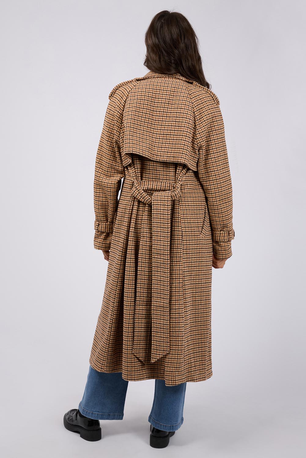 A model wearing the Charlotte Trench in colour Multi, from the back