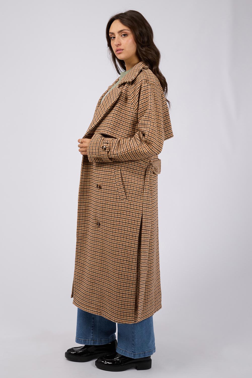 A model wearing the Charlotte Trench in colour Multi, from the front, showing the whole outfit
