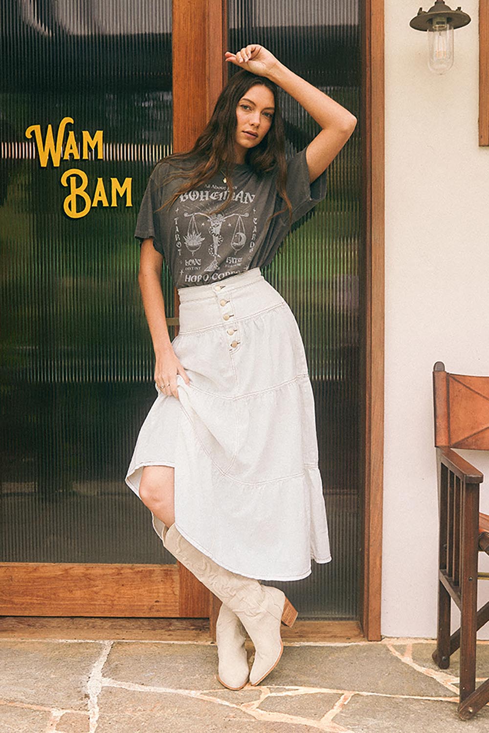 A model wearing the Coco Denim Maxi Skirt in colour Vinwhite (White), from the front, showing the whole outfit