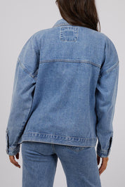 A model wearing the Sydney Jacket in colour Lightblue (Blue), from the back