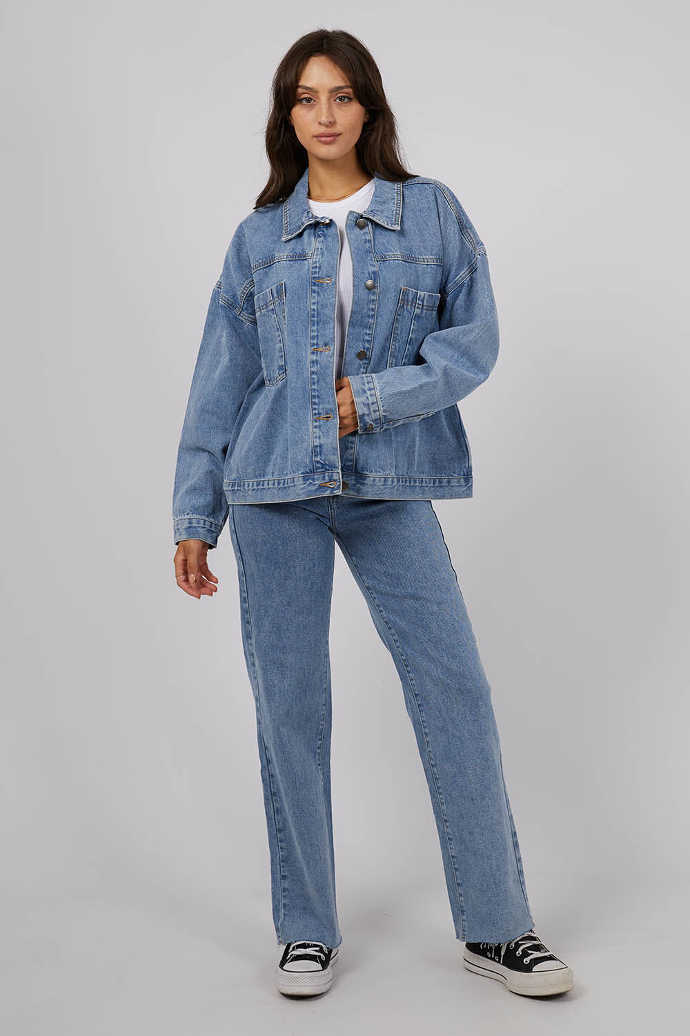 A model wearing the Sydney Jacket in colour Lightblue (Blue), from the front, showing the whole outfit