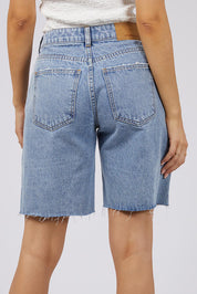 A model wearing the Lexie Denim Short in colour Lblue (Blue), from the back