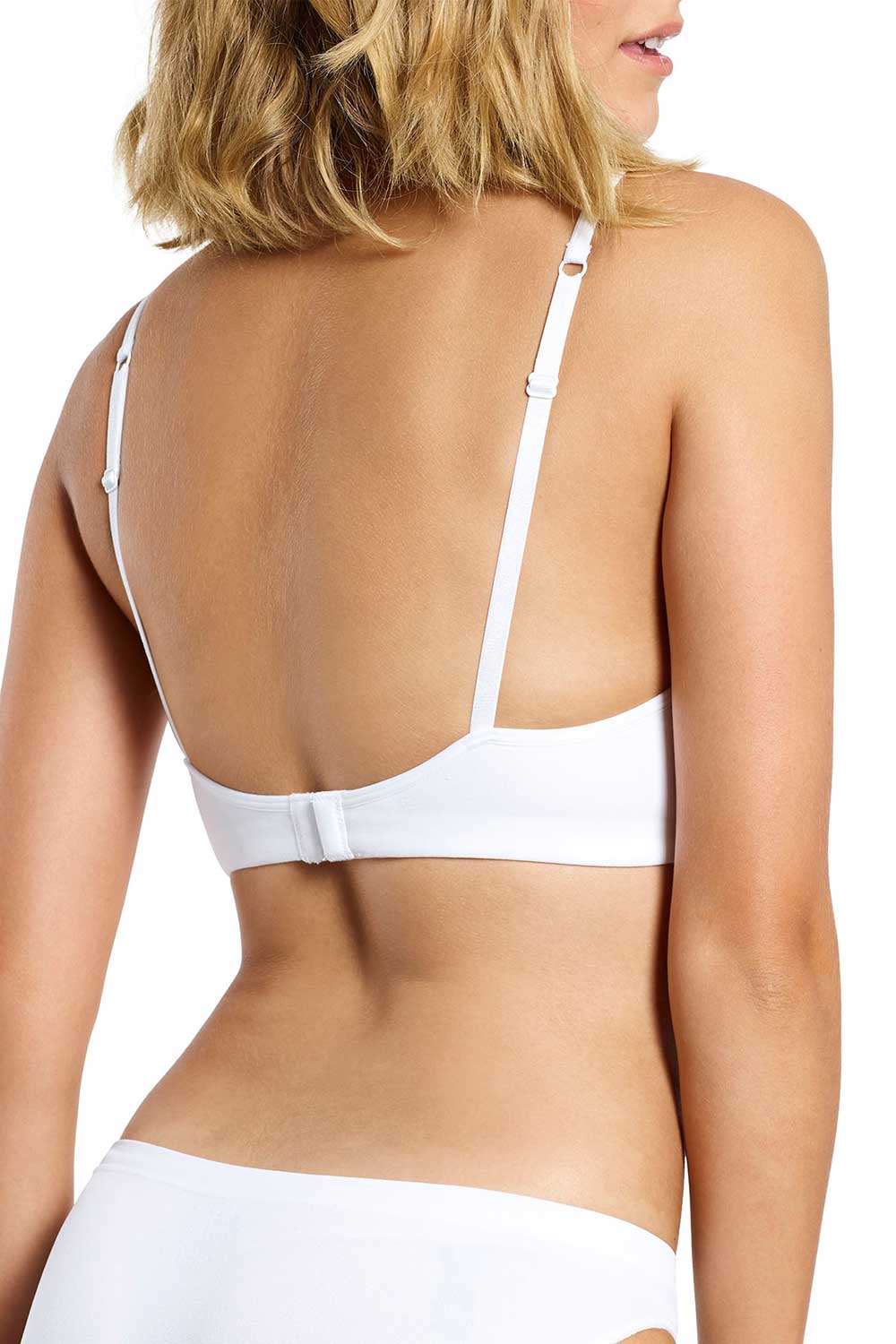 A model wearing the Seamless Singles Wirefree Bra in colour White (White), from the back