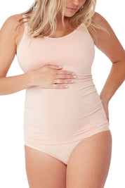 A model wearing the Bamboo Feeding Cami in colour Puttypink (Pink), from the front, cropped image