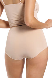 A model wearing the Bondi Bare Full Brief in colour RoseBeige, from the back