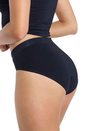 A model wearing the Bondi Bare Hi Cut Brief in colour Black (Black), from the back