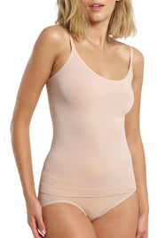 A model wearing the Bondi Bare Singlet in colour RoseBeige, from the front, cropped image