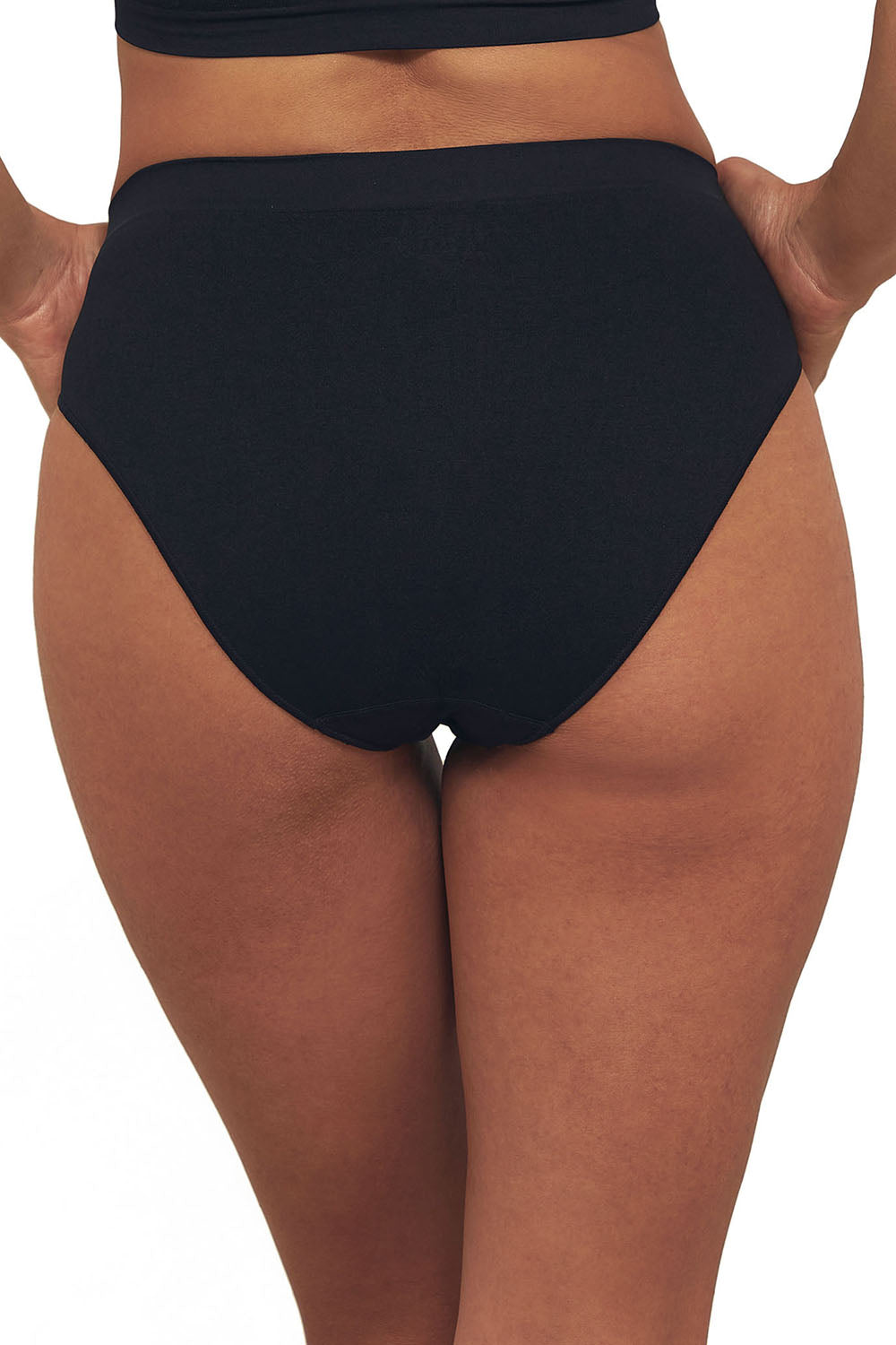 A model wearing the Bare Essentials Hi Cut Brief in colour Black (Black), from the back