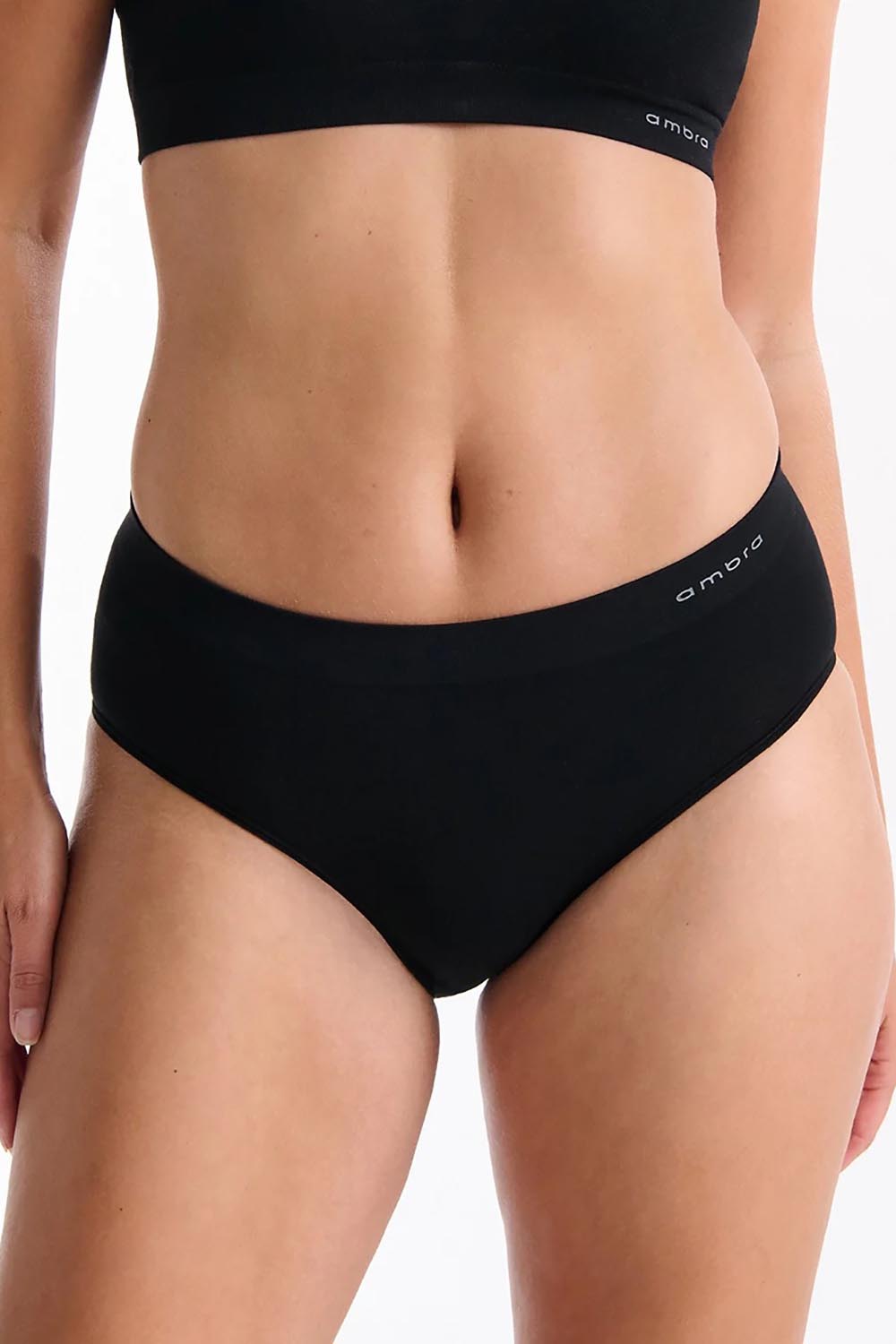 A model wearing the Pure Basics Modal Midi Briefs 2 Pack in colour Black (Black), from the front, cropped image