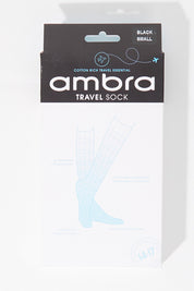 A model wearing size S of the Travel Sock in colour Black (Black), from the front, showing the whole outfit