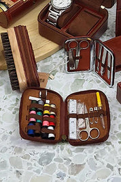 A model wearing the Travel Sewing Kit in colour Cognac, from the front, showing the whole outfit