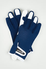 A model wearing the Sprout Goatskin Gloves in colour Navy (Blue), from the front, showing the whole outfit