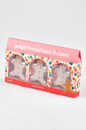 A model wearing size OneSize of the Christmas Gingerbread Men Fizz in colour Ginger (Pink), from the front, showing the whole outfit