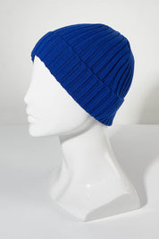 A model wearing size OneSize of the Tucker Merino Wool Beanie in colour Royal (Blue), from the front, showing the whole outfit