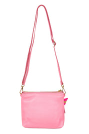 Product shot of the Alexis Leather Crossbody in colour Blossom (Pink), from the back