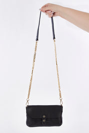 A model wearing size OneSize of the Paige Leather Wallet in colour Black (Black), from the front, showing the whole outfit