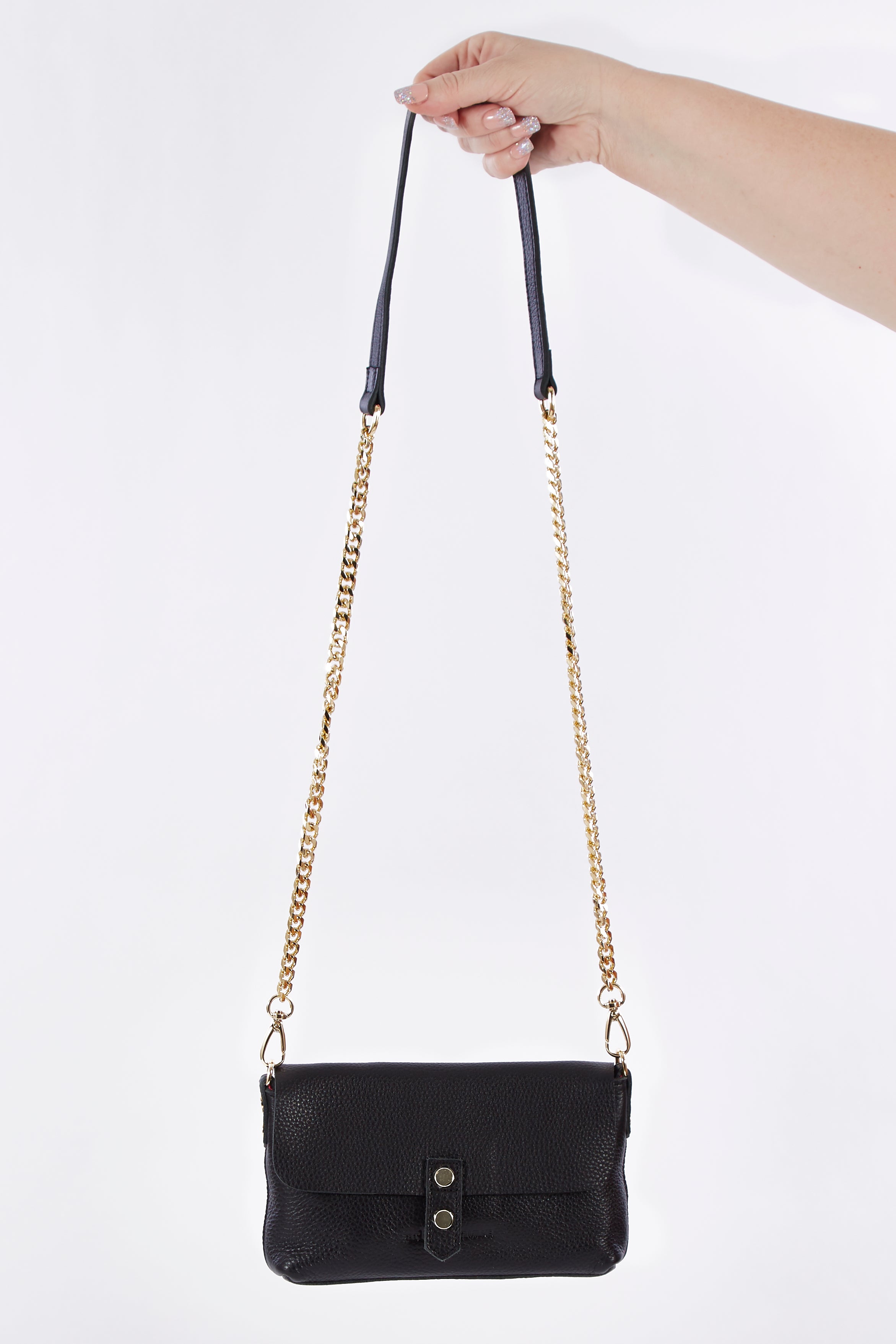 A model wearing size OneSize of the Paige Leather Wallet in colour Black (Black), from the front, showing the whole outfit