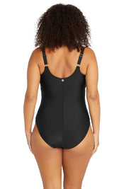 A model wearing the Delacroix One Piece in colour Black (Black), from the back
