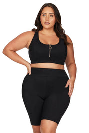 A model wearing the Michelangelo Bike Pant in colour Black (Black), from the front, cropped image