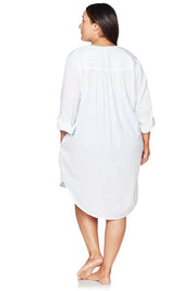 A model wearing the Gershwin Overshirt Cover Up in colour White (White), from the back