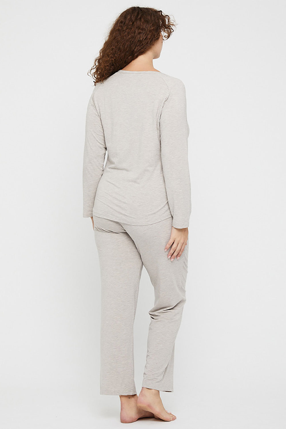 A model wearing the Relax PJ Long Bamboo Pants in colour Oatmeal, from the back