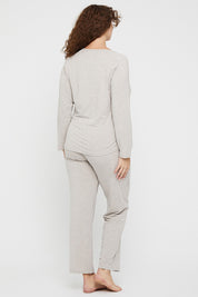 A model wearing the Relax PJ Long Bamboo Pants in colour Oatmeal, from the back