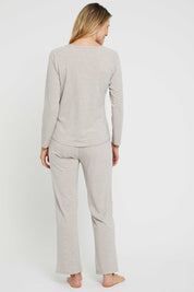 A model wearing the Relax PJ Long Bamboo Pants in colour Oatmeal, from the back