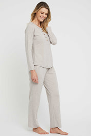 A model wearing the Relax PJ Long Bamboo Pants in colour Oatmeal, from the front, showing the whole outfit