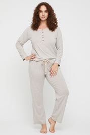A model wearing the Relax PJ Long Bamboo Pants in colour Oatmeal, from the front, showing the whole outfit