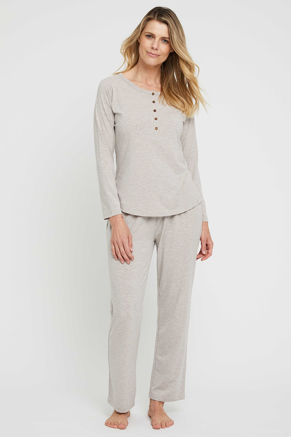 A model wearing the Relax PJ Long Bamboo Pants in colour Oatmeal, from the front, showing the whole outfit