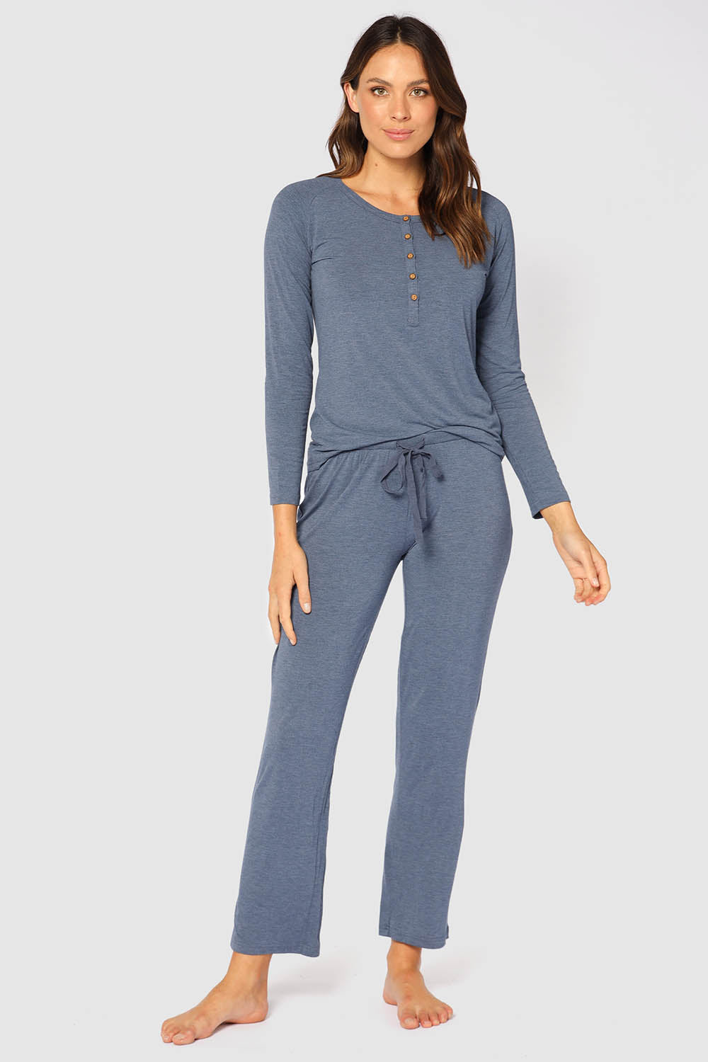 A model wearing the Relax PJ Long Bamboo Pants in colour Twilight (Blue), from the front, showing the whole outfit