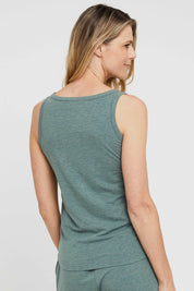 A model wearing the Henley Bamboo Singlet in colour Moss (Green), from the back
