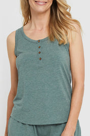 A model wearing the Henley Bamboo Singlet in colour Moss (Green), from the front, cropped image