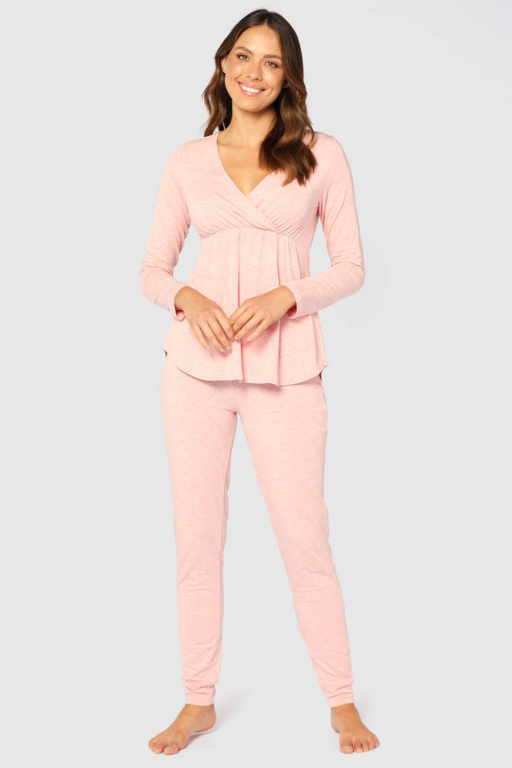 A model wearing the Long Sleeve Cross Front PJ Top in colour Rose (Pink), from the front, showing the whole outfit