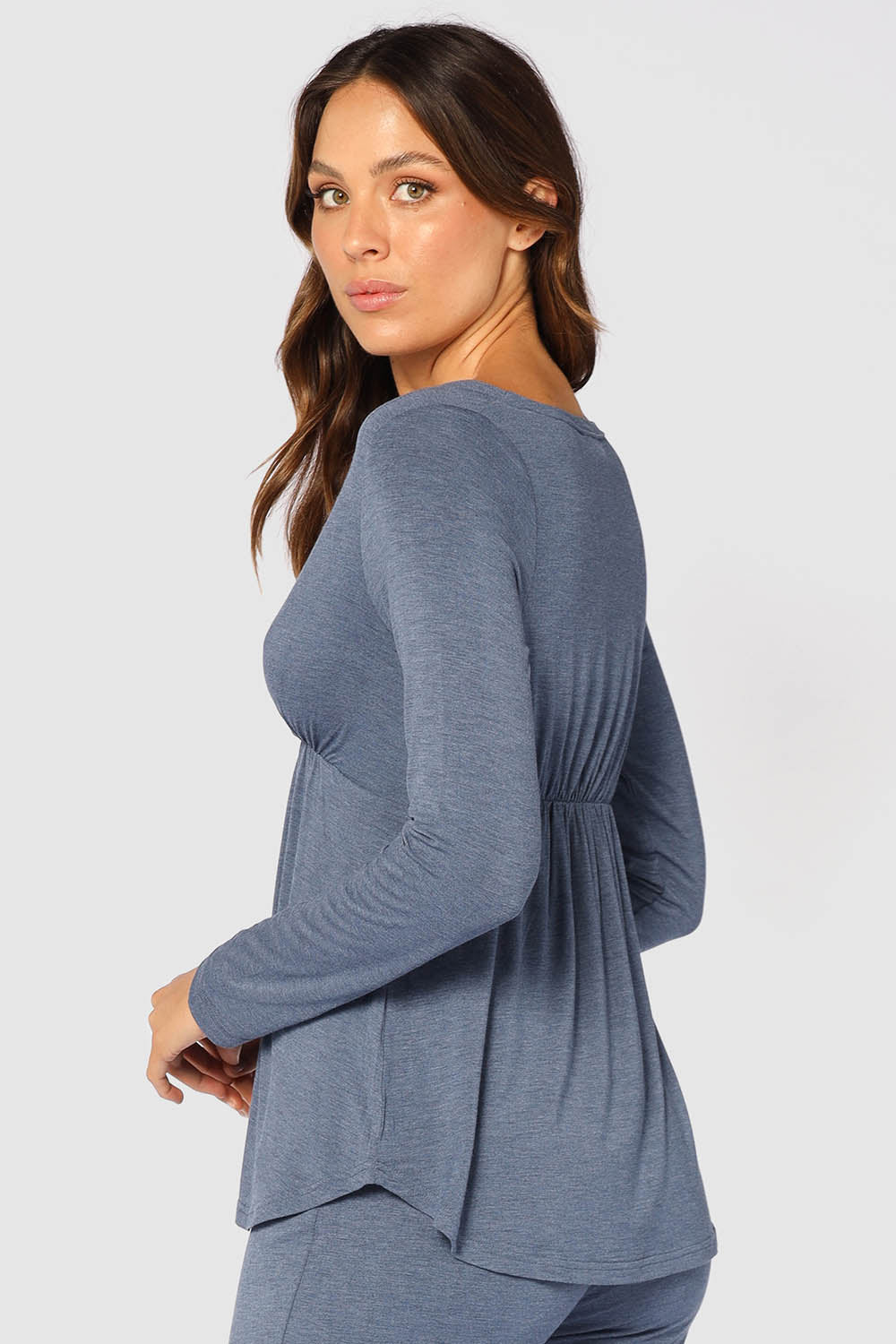 A model wearing the Long Sleeve Cross Front PJ Top in colour Twilight (Blue), from the back