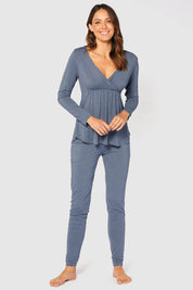 A model wearing the Long Sleeve Cross Front PJ Top in colour Twilight (Blue), from the front, showing the whole outfit
