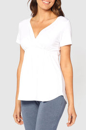 A model wearing the Short Sleeve Cross Front PJ Top in colour White (White), from the front, cropped image