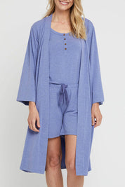A model wearing the Bamboo Robe in colour Lavender (Blue), from the front, cropped image