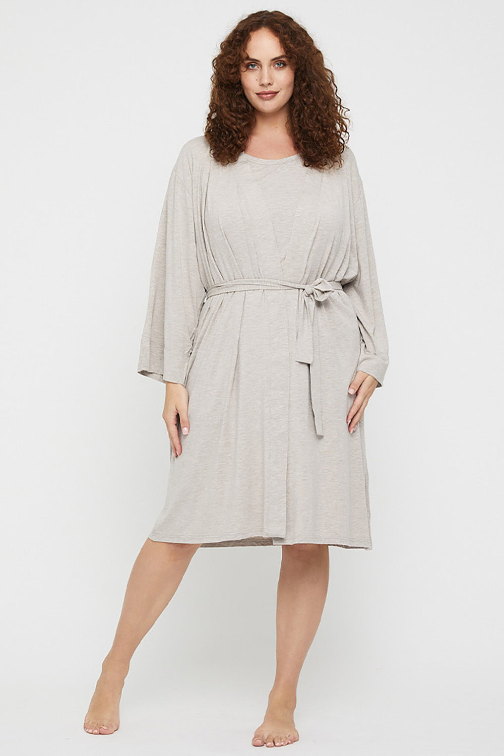 A model wearing the Bamboo Robe in colour Oatmeal, from the front, showing the whole outfit